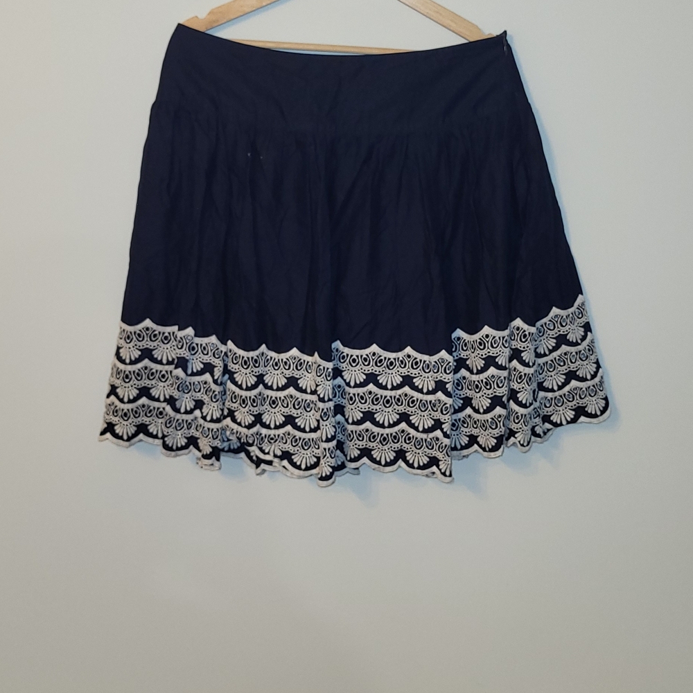 Elegant Navy Blue Skirt with White Lace Trim